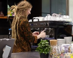 Barista making coffee