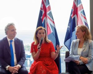 Commissioner McAlary-Smith speaking in a conference with Paul Guerra and Ylva Carosone